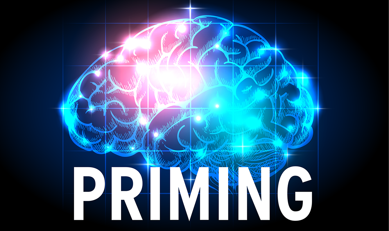 Illustrated image of a brian with firing pathways lit up and the word Priming overlayed 